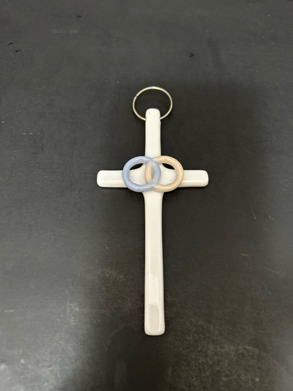 White Ceramic Cross Wall Accent with Blue and Cream Rings